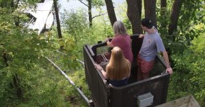 Family on inclined elevator