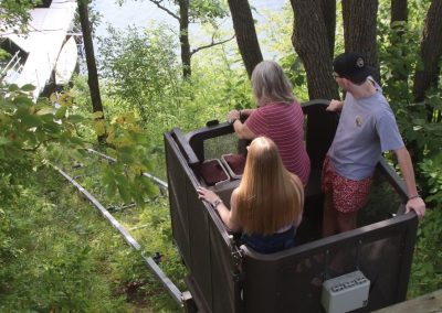 Family on inclined elevator